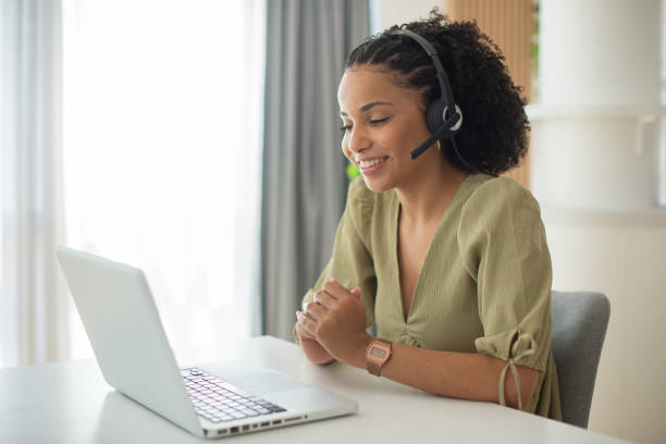 istock Young businesswoman working in a call center 1412329192