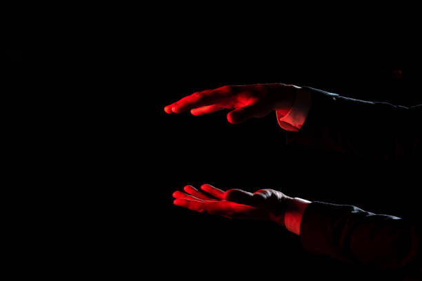 istock Businessman Presenting Important Informations Between Hands. Man In Suit Showing Crutial Updates Among Palms. Executive Holding Critical Announcements. 1412329275