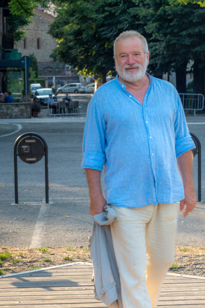 istock elegant senior caucasian man outdoors summertime 1412329581