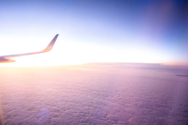 istock View from the plane on a beautiful orange sunset 1412337824