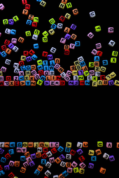istock Colorful English consonant scattered It is on a black background 1412344319