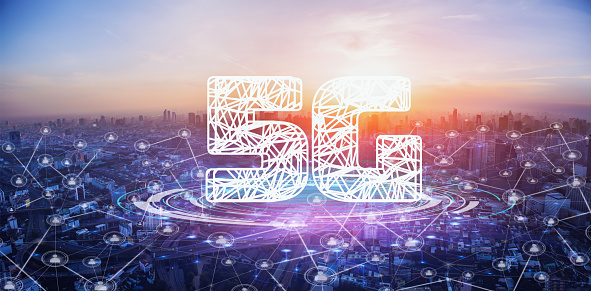 5G network wireless systems. 5G network digital hologram and internet of things on city background.