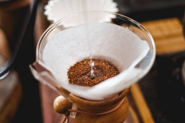 istock Closeup of hands barista make coffee 1412361321
