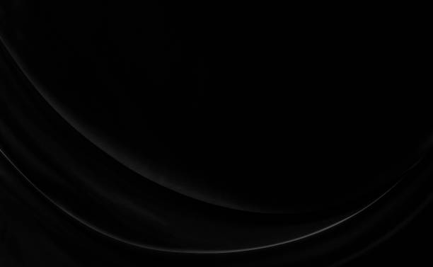 istock Black gray satin dark fabric texture luxurious shiny that is abstract silk cloth background with patterns soft waves blur beautiful. 1412362866