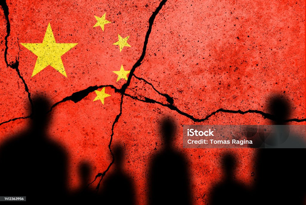 Flag of China painted on a cracked wall. Chinese real estate and debt crisis Coronavirus Stock Photo