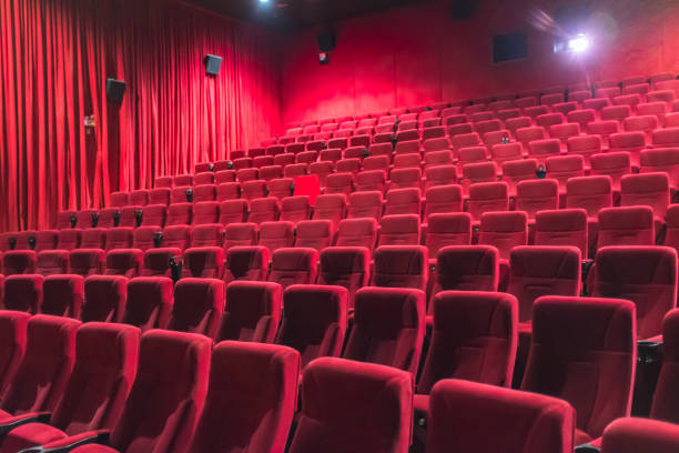 istock Cinema, Seats, Empty rows of red seats 1412365453