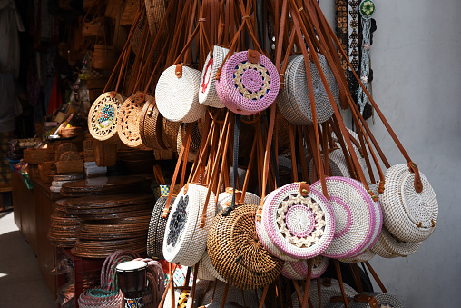 Balinese handmade bags in a local souvenir market in Bali, Indonesia