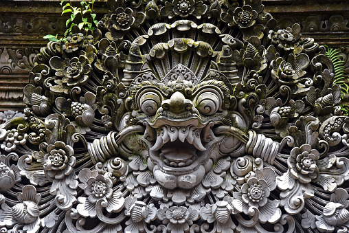 Bali deity stone carving Hinduism belief