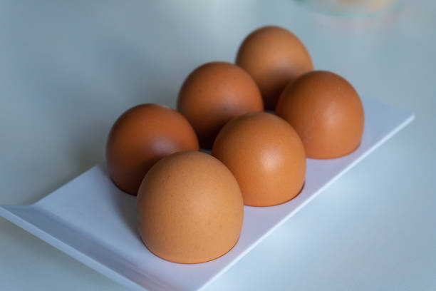 istock Brown chicken eggs. 6 fresh chicken brown eggs. 1412366344
