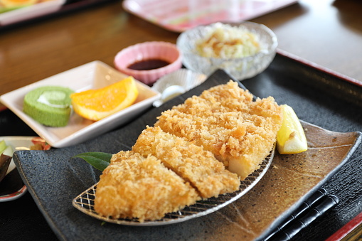 The crispy deep fried pork named donkatsu served with Japanese rice and Miso soup.