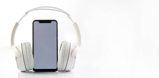 istock White headphones on smartphone music online concept, mockup, isolate on white 1412369782