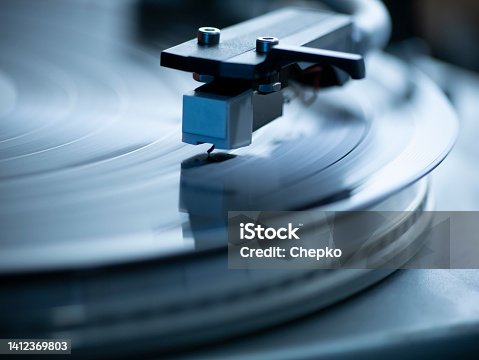 istock Vintage turntable vinyl record player 1412369803