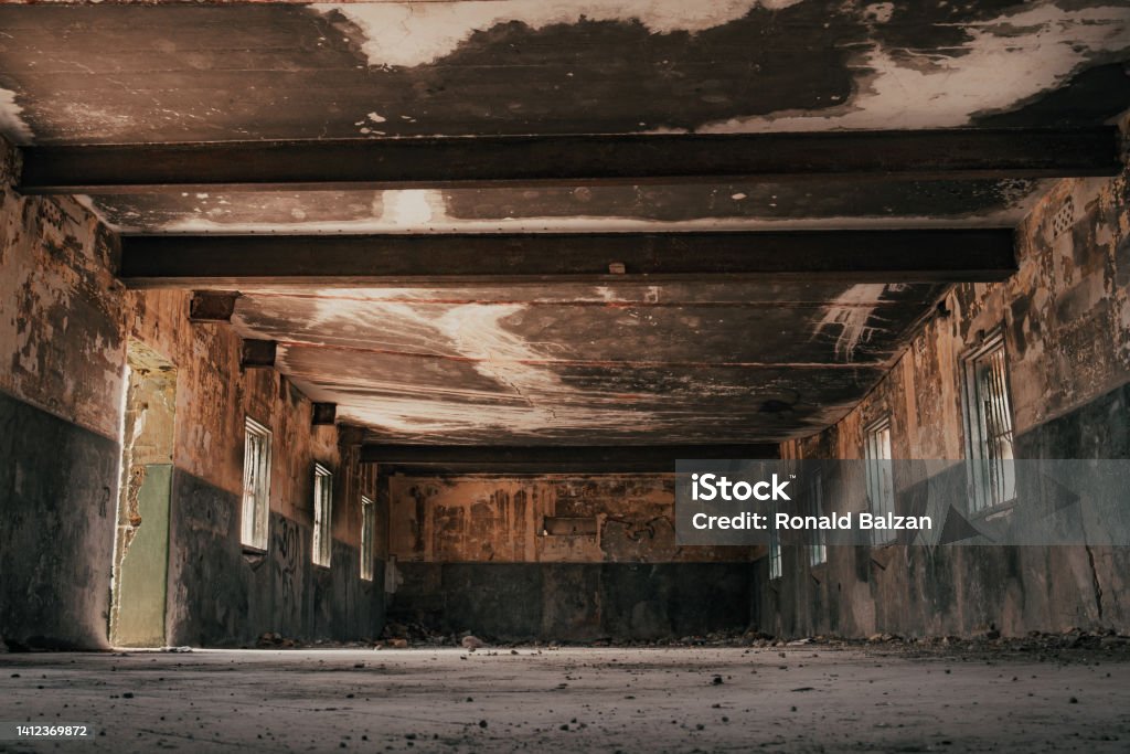 Abandoned derelict room and building with scratched and etched markings - grunge An abandoned 1940's british compound in Malta now stands derelict and abandoned Abandoned Stock Photo