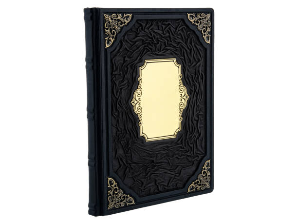 istock Dark Leather mockup book with cover color isolated on white background, front view. With empty lable and metal fittings. 1412372016