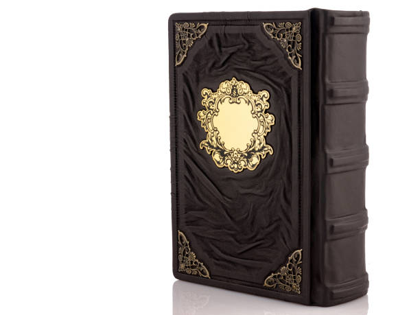 istock Dark Leather mockup book with cover color isolated on white background, front view. With empty lable and metal fittings. 1412372035