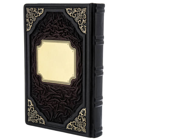 istock Dark Leather mockup book with cover color isolated on white background, front view. With empty lable and metal fittings. 1412372057