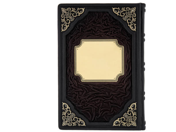 istock Dark Leather mockup book with cover color isolated on white background, front view. With empty lable and metal fittings. 1412372059