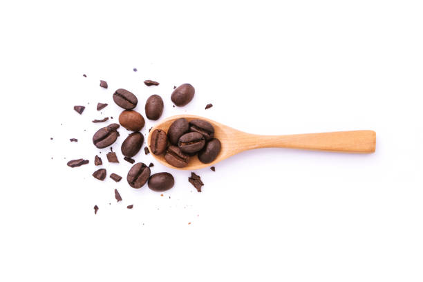 istock Coffee beans with broken in wooden spoon isolated on white background. 1412374710