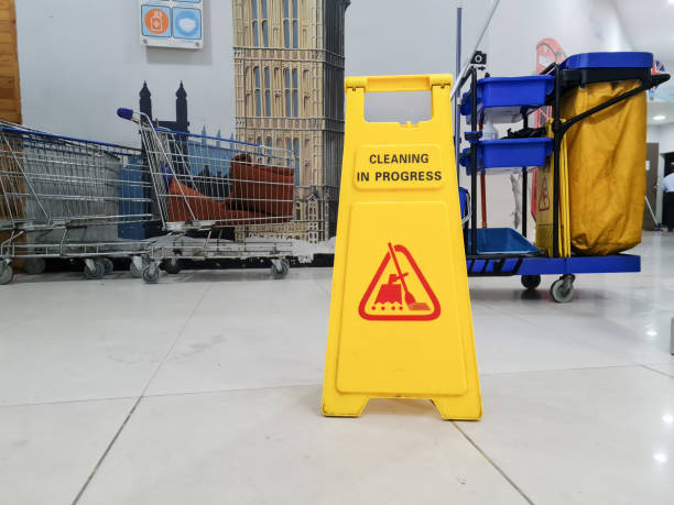 istock cleaning in progress sign on yellow plastic board on floor 1412377293