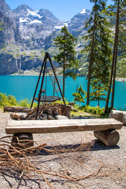 Switzerland landscape - barbecue in Oeschinensee lake Switzerland landscape - barbecue in Oeschinensee lake lake oeschinensee stock pictures, royalty-free photos & images