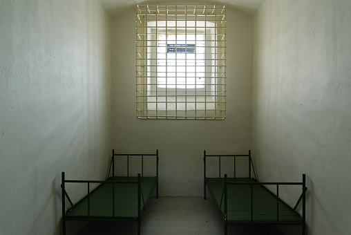 Prison cell with two beds used in communist Czechoslovakia