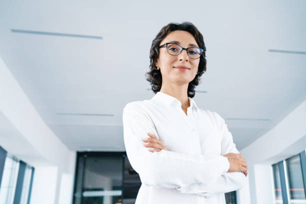 istock Successful Middle-aged business woman looks into camera 1412381271