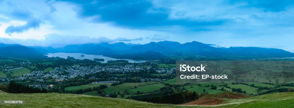 Panoramic view of Keswick and Derwentwater from Latrigg, Lake District National Park, UNESCO World Heritage Site, Cumbria, England, United Kingdom, Europe Cloud - Sky Stock Photo