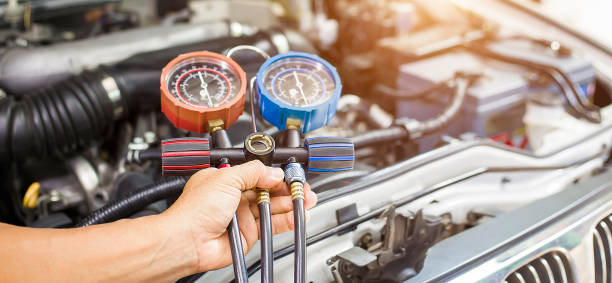 istock Car air conditioner check service, leak detection, fill refrigerant. 1412386396