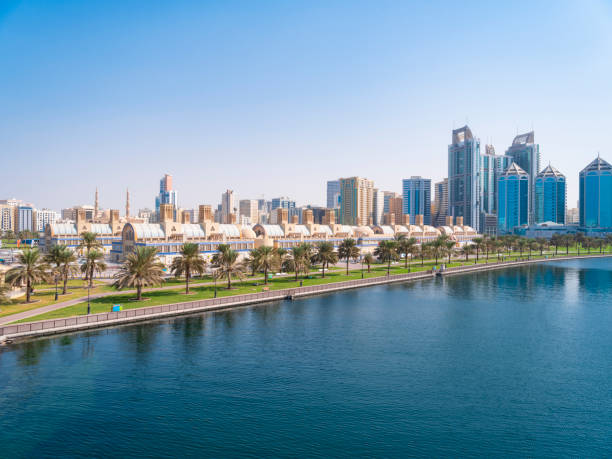 View of the central Souq in Sharjah, UAE Sharjah downtown, with the Central Souq in the foreground and downton's skyscrapers in the background. sharjah city stock pictures, royalty-free photos & images