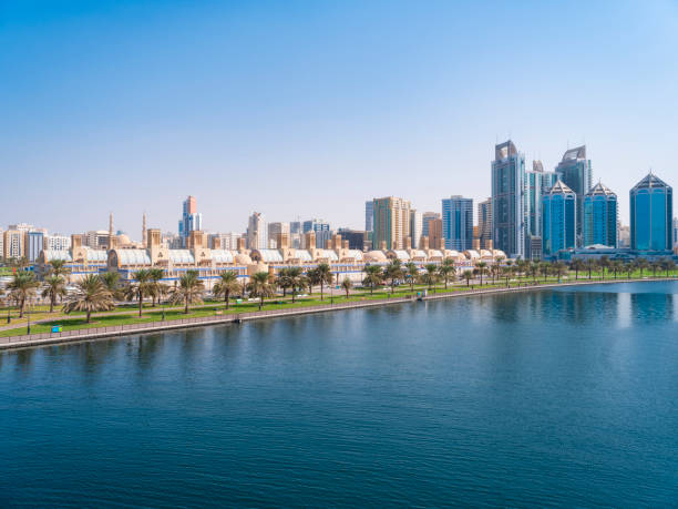 View of the central Souq in Sharjah, UAE Sharjah downtown, with the Central Souq in the foreground and downton's skyscrapers in the background. sharjah city stock pictures, royalty-free photos & images
