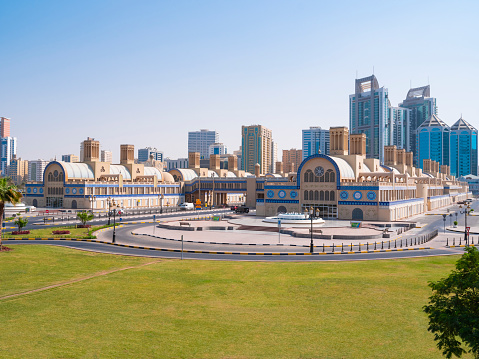 DUBAI, UAE - January 25, 2019: A view of Burj Khalifa Lake, Downtown Dubai and the iconic dhow-shaped building of Dubai Opera is a masterpiece of contemporary design, Burj Park, Downtown Dubai