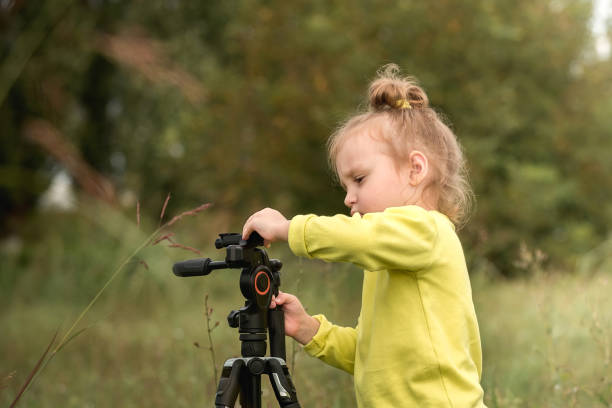 istock children in nature imitate adults 1412386840
