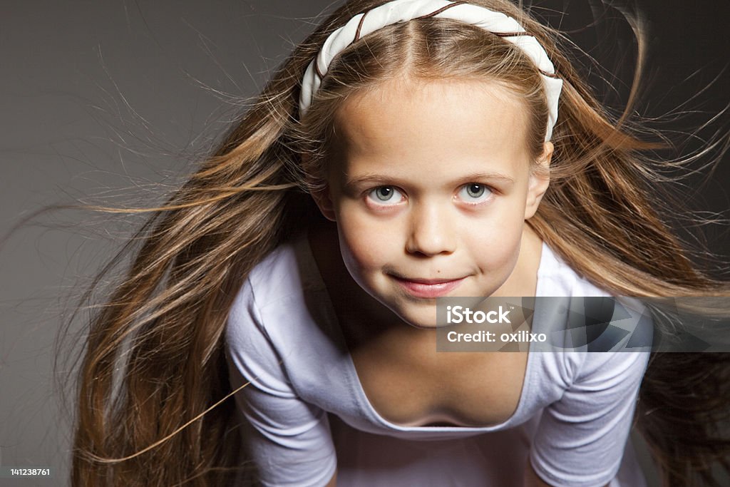 Beautiful Girl With Long Blonde Hair On Gray Stock Photo - Download Image  Now - 8-9 Years, Beautiful People, Beauty - iStock