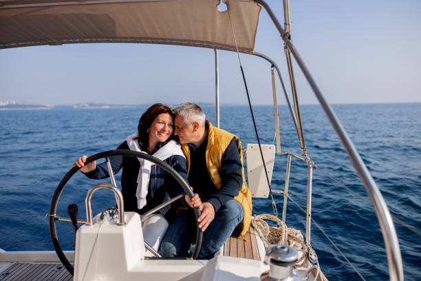 istock Lovely Senior Couple Hugging On A Yacht 1412388510