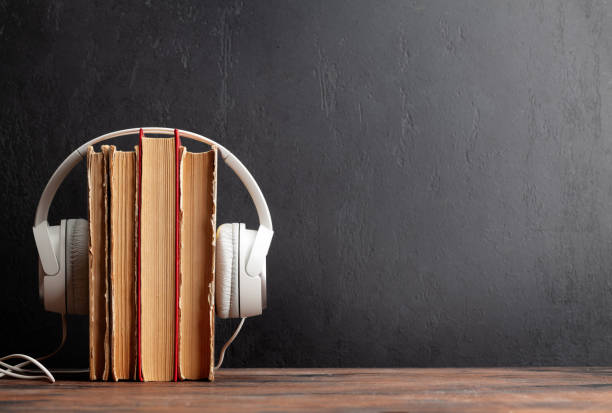 istock Old books and headphones 1412391777