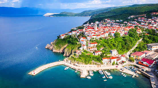 Krk, Croatia. Breathtakingdrone view of Vrbnik village, summer seascape on Adriatic. Beautiful traveling concept background of Mediterranean Sea.