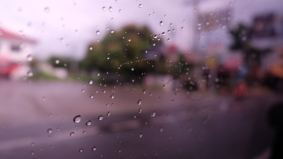 Raindrops on the car window.