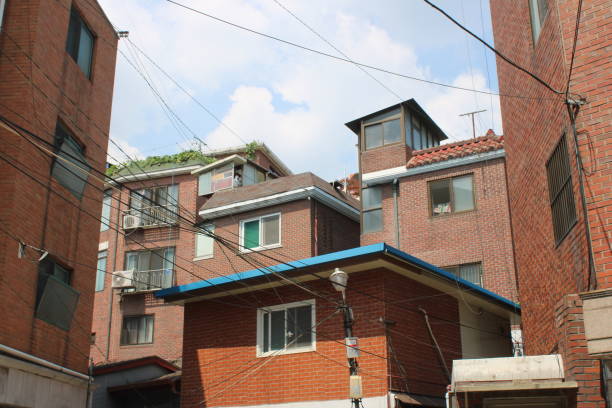 Seoul, Korea-July 26, 2022: Street view of traditional Villa homes and apartment buildings, near downtown Noksapyeong, Seoul