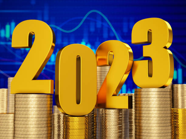 istock 2023 Numbers Sitting Over Coin Stacks with a Financial Chart 1412400231