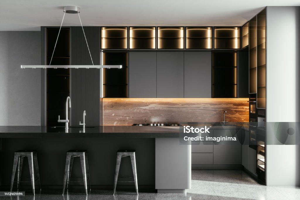 Modern Kitchen In Luxury Home Black / gray modern kitchen interior with island, sink, cabinets, kitchen appliances and marble floor in a new luxury home. Kitchen Stock Photo