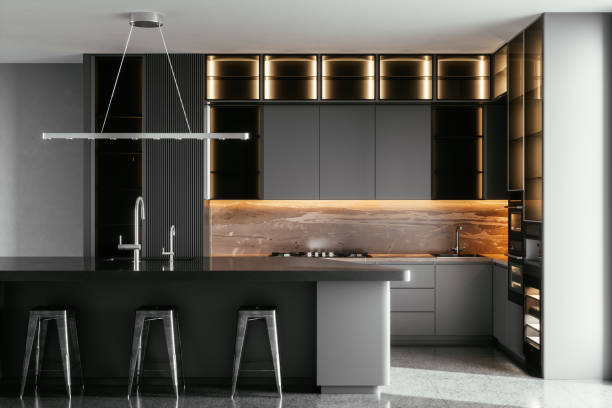 Modern Kitchen In Luxury Home Black / gray modern kitchen interior with island, sink, cabinets, kitchen appliances and marble floor in a new luxury home. domestic kitchen photos stock pictures, royalty-free photos & images