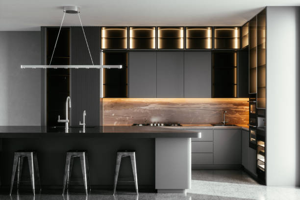 Modern Kitchen In Luxury Home Black / gray modern kitchen interior with island, sink, cabinets, kitchen appliances and marble floor in a new luxury home. kitchen stock pictures, royalty-free photos & images