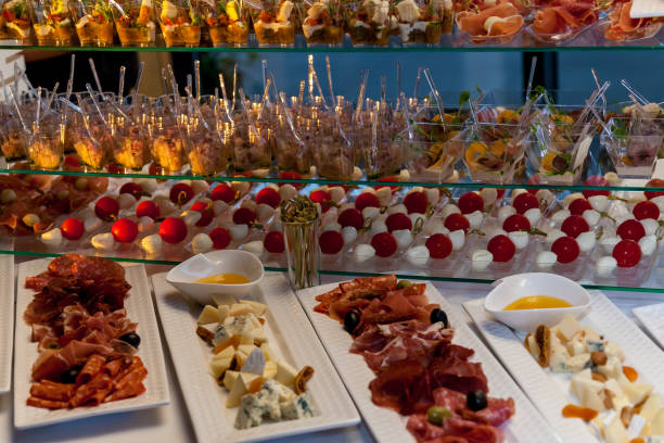 istock cold appetizers of meat and cheese for a party 1412403228