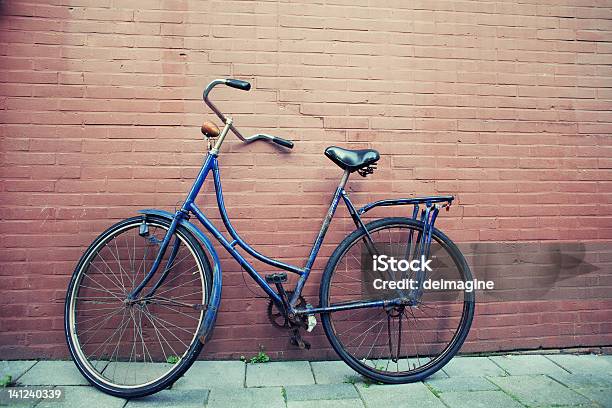 Old Blue Bicycle Wall Peeling Stock Photo - Download Image Now - Bicycle, City, Dirt Road