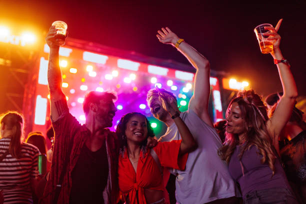 istock Cheerful crew dancing together and an outdoors festival 1412406491