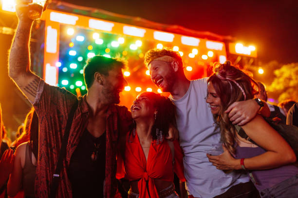 istock Four friends enjoying their favorite band 1412406495
