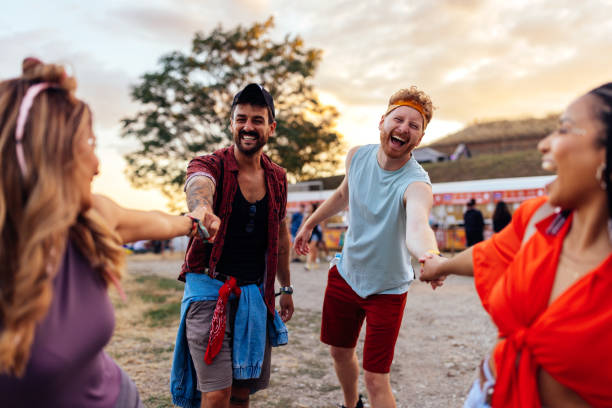 istock Young crew having fun at festival 1412406515