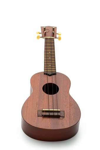 Studio shot:  Ukulele.  isolated on a white background. High angle view.