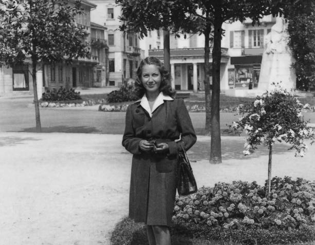 istock Young Woman in Public Park, 1941. 1412412395