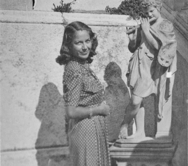istock Young beautiful woman in 1941. 1412413495